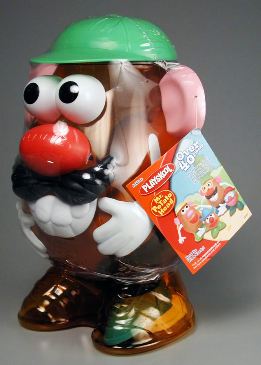 Featured is a photo of a current version of a classic character toy ... the 2004 Mr. Potato Head (Mint in Wrapper - really the way to keep them ... but is that any fun?!).  Mr. Potato Head and family has had a long run ... this family of character toys came on stage in the early 1950s.  I remember mine!